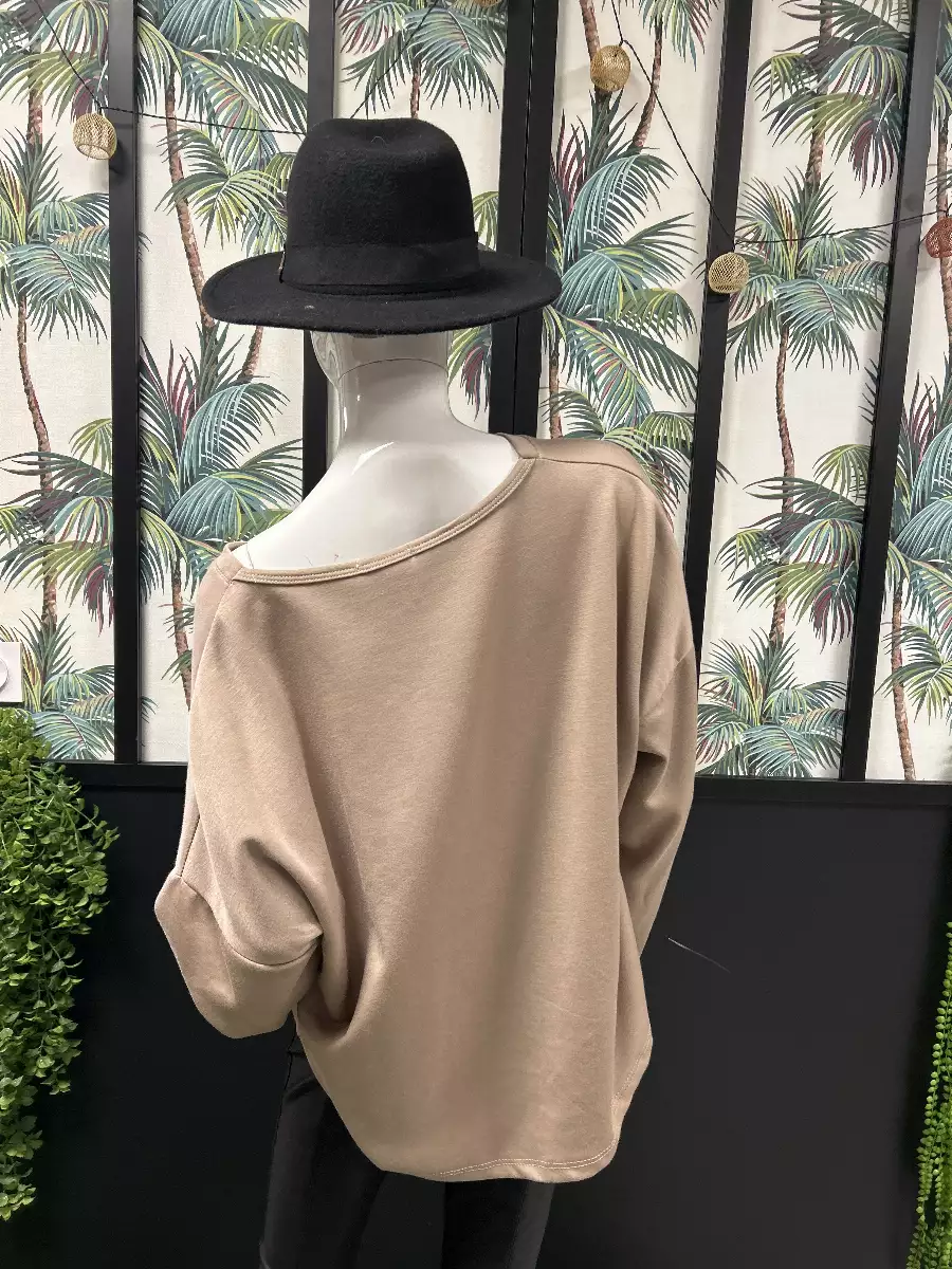 Pull beige à motif